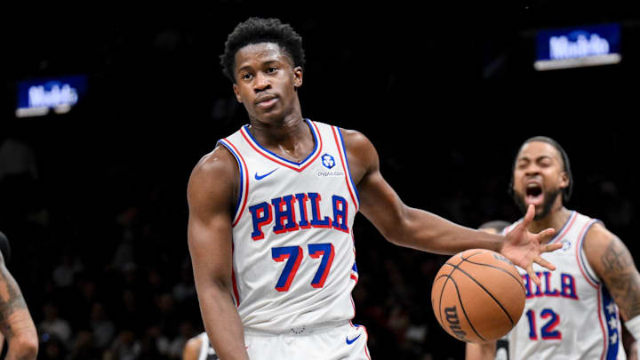 Nov 2, 2025; Brooklyn, New York, USA; Philadelphia 76ers guard VJ Edgecombe (77) reacts after a dunk against the Brooklyn Nets during the first half at Barclays Center. Mandatory Credit: John Jones-Imagn Images