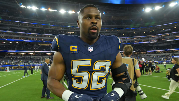 Khalil Mack walks off field after win.