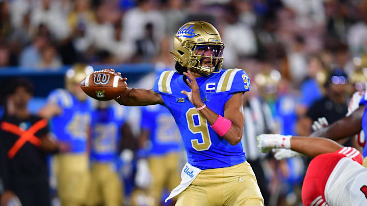 Aug 30, 2025; Pasadena, California, USA;  UCLA Bruins quarterback Nico Iamaleava (9) throws against the against the Utah Utes during the first half at the Rose Bowl. Mandatory Credit: Gary A. Vasquez-Imagn Images