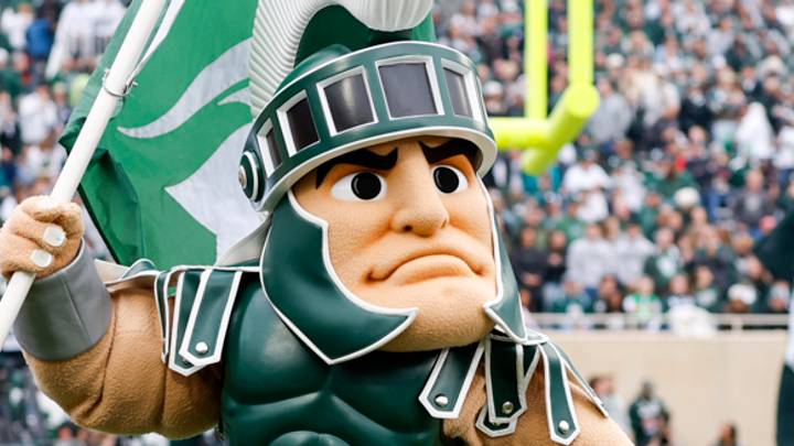 Michigan State mascot Sparty carries a flag during the Spartans' game against UCLA on Oct. 11, 2025. Michigan State mascot Sparty carries a flag during the Spartans' game against UCLA on Oct. 11, 2025.