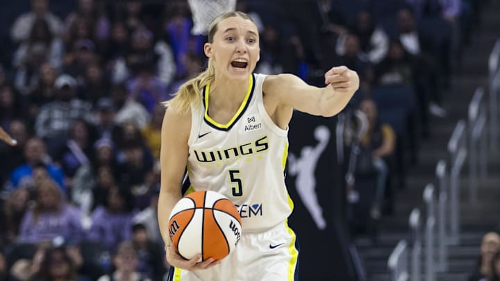 Jul 25, 2025; San Francisco, California, USA;  Dallas Wings guard Paige Bueckers (5) gestures against the Golden State Valkyries during the first quarter at Chase Center. Mandatory Credit: John Hefti-Imagn Images