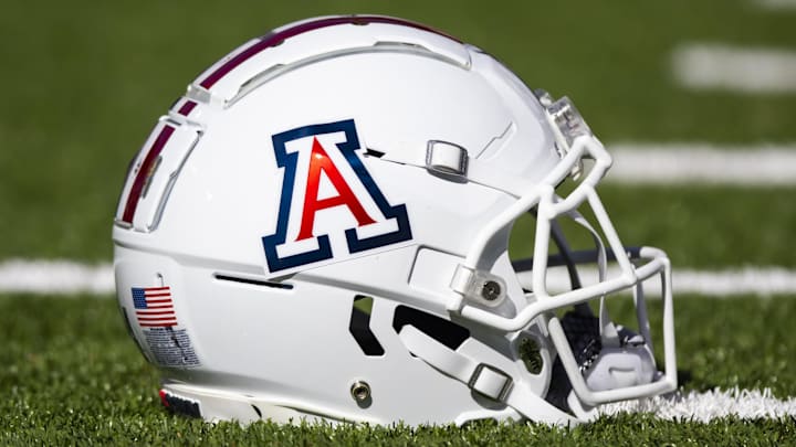 Nov 25, 2022; Tucson, Arizona, USA; Detailed view of an Arizona Wildcats helmet on the field during the Territorial Cup at Arizona Stadium. Mandatory Credit: Mark J. Rebilas-Imagn Images