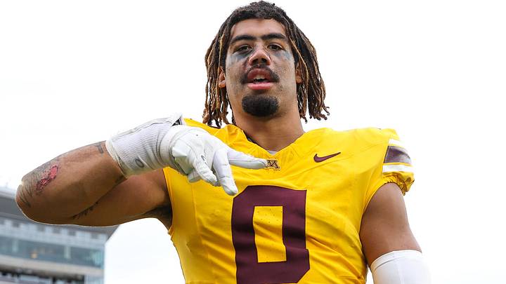 Minnesota Golden Gophers defensive lineman Anthony Smith celebrates his teams win against the Nevada Wolf Pack.