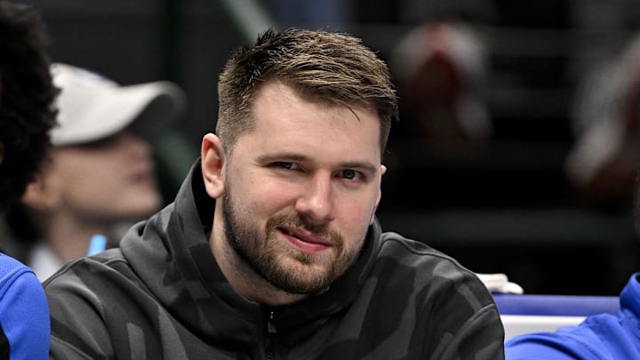 Jan 27, 2025; Dallas, Texas, USA; Dallas Mavericks guard Luka Doncic looks on from the team bench during the second quarter against the Washington Wizards at the American Airlines Center. Mandatory Credit: Jerome Miron-Imagn Images