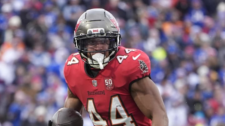 Nov 16, 2025; Orchard Park, New York, USA;  Tampa Bay Buccaneers running back Sean Tucker (44) runs the ball for a touchdown against the Buffalo Bills during the second half of the game at Highmark Stadium. Mandatory Credit: Gregory Fisher-Imagn Images