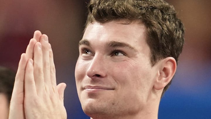 Jan 9, 2026; Atlanta, GA, USA; Indiana Hoosiers quarterback Fernando Mendoza (15) reacts after the 2025 Peach Bowl and semifinal game of the College Football Playoff at Mercedes-Benz Stadium. Mandatory Credit: Dale Zanine-Imagn Images