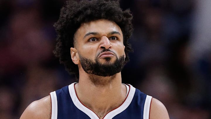 Dec 22, 2025; Denver, Colorado, USA; Denver Nuggets guard Jamal Murray (27) reacts after a play in the first quarter against the Utah Jazz at Ball Arena. Mandatory Credit: Isaiah J. Downing-Imagn Images
