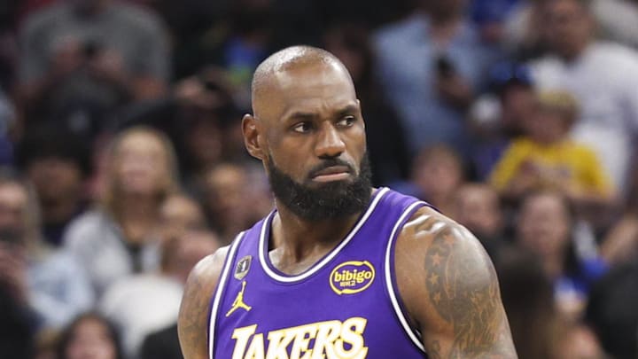 Los Angeles Lakers forward LeBron James reacts to a call by referee Marc Davis.