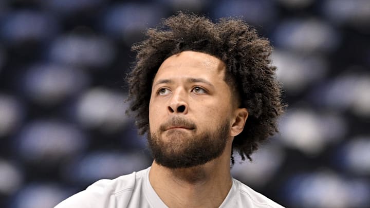 Detroit Pistons guard Cade Cunningham warms up before the game against the Dallas Mavericks. Detroit Pistons guard Cade Cunningham warms up before the game against the Dallas Mavericks.