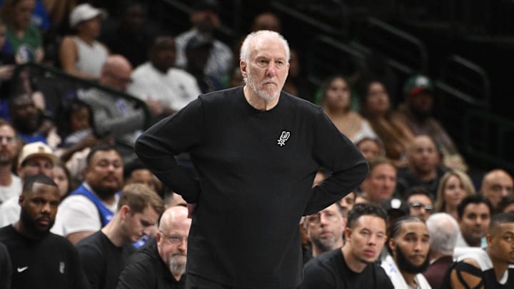 San Antonio Spurs head coach Gregg Popovich stands on the sidelines during a game.