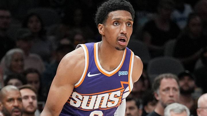 Oct 14, 2026; San Antonio, Texas, USA;  Phoenix Suns forward Ryan Dunn (0) dribbles in the second half against the San Antonio Spurs at Frost Bank Center.  Mandatory Credit: Daniel Dunn-Imagn Images