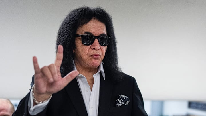 KISS' Gene Simmons goes up an escalator KISS' Gene Simmons goes up an escalator