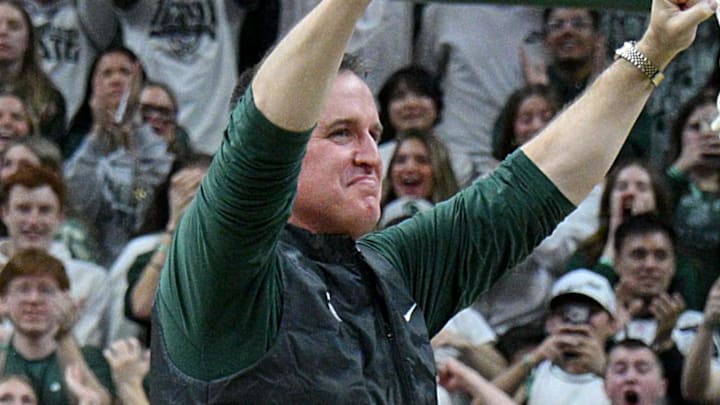 Dec 2, 2025; East Lansing, Michigan, USA;  Michigan State head football coach Pat Fitzgerald watches the Spartans defeat the Iowa Hawkeyes at Jack Breslin Student Events Center. Mandatory Credit: Dale Young-Imagn Images