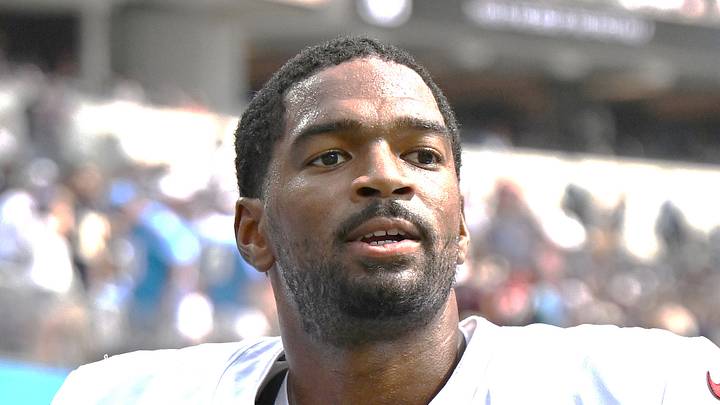 Arizona Cardinals quarterback Jacoby Brissett runs off the field