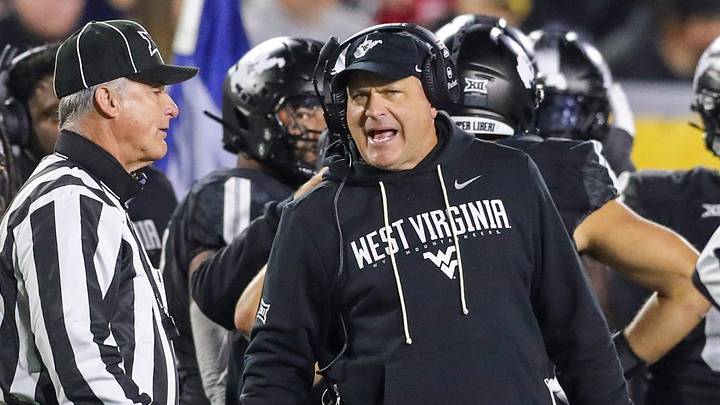 Oct 25, 2025; Morgantown, West Virginia, USA; West Virginia Mountaineers head coach Rich Rodriguez argues a call during the third quarter against the Texas Christian University Horned Frogs at Milan Puskar Stadium. Mandatory Credit: Ben Queen-Imagn Images