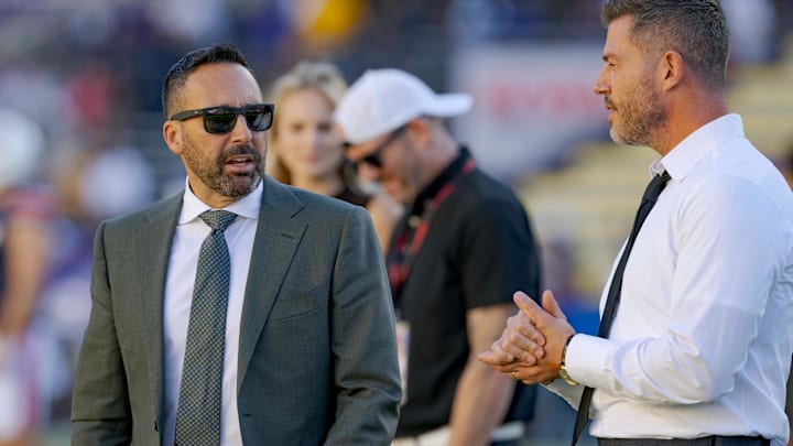 Oct 14, 2023; Baton Rouge, Louisiana, USA;  Sportscaster Joe Tessitore, left, talks with sportscaster Jesse Palmer before a game between the LSU Tigers and the Auburn Tigers at Tiger Stadium. Mandatory Credit: Matthew Hinton-Imagn Images