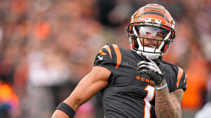 Cincinnati Bengals wide receiver Ja'Marr Chase (1) smiles after completing a deep pass in the first quarter of the NFL Week 15 game between the Cincinnati Bengals and the Minnesota Vikings at PayCor Stadium in downtown Cincinnati on Saturday, Dec. 16, 2023.