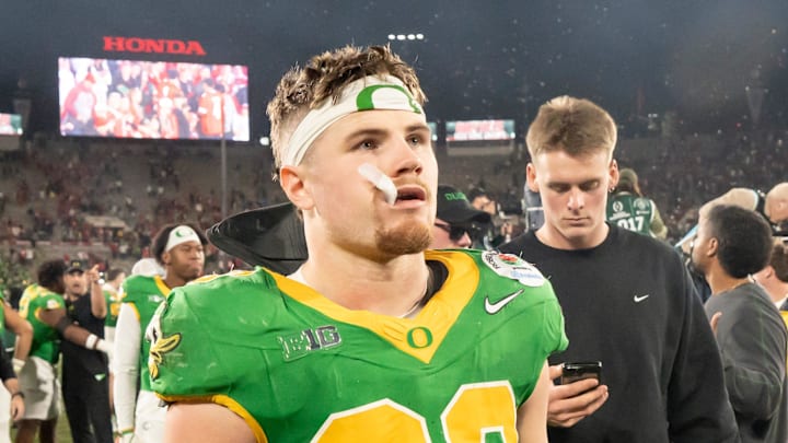 Oregon inside linebacker Bryce Boettcher walks off the field as the Oregon Ducks face the Ohio State Buckeyes Wednesday, Jan. 1, 2025, in the quarterfinal of the College Football Playoff at the Rose Bowl in Pasadena, Calif.