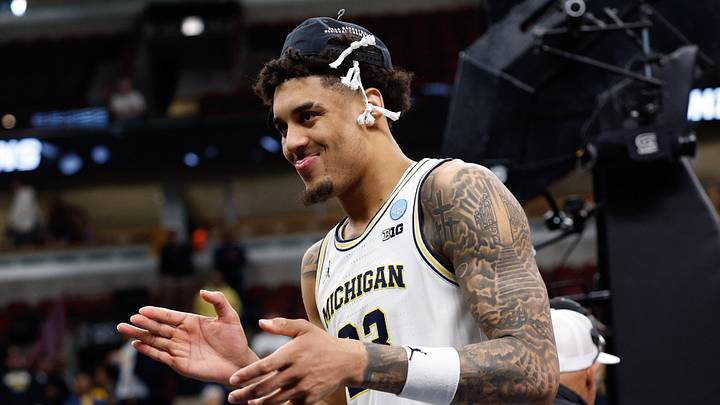 Mar 29, 2026; Chicago, IL, USA; Michigan Wolverines forward Yaxel Lendeborg (23) reacts after defeating the Tennessee Volunteers in an Elite Eight game of the Midwest Regional of the men's 2026 NCAA Tournament at United Center. Mandatory Credit: Kamil Krzaczynski-Imagn Images