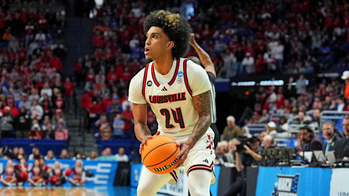 Mar 20, 2025; Lexington, KY, USA; Louisville Cardinals guard Chucky Hepburn (24) shoots the ball during the first half against the Creighton Bluejays in the first round of the NCAA Tournament at Rupp Arena. Mandatory Credit: Aaron Doster-Imagn Images