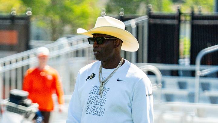 Deion Sanders spends time with his son, Cleveland Browns quarterback Shedeur Sanders (2) at the conclusion of the second day of training camp, July 30, 2026, in Berea, Ohio. Deion Sanders spends time with his son, Cleveland Browns quarterback Shedeur Sanders (2) at the conclusion of the second day of training camp, July 30, 2026, in Berea, Ohio.