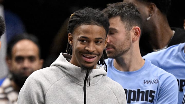 Nov 22, 2025; Dallas, Texas, USA; Memphis Grizzlies guard Ja Morant (12) looks on from the team bench during the second half against the Dallas Mavericks at the American Airlines Center. Mandatory Credit: Jerome Miron-Imagn Images Nov 22, 2025; Dallas, Texas, USA; Memphis Grizzlies guard Ja Morant (12) looks on from the team bench during the second half against the Dallas Mavericks at the American Airlines Center. Mandatory Credit: Jerome Miron-Imagn Images