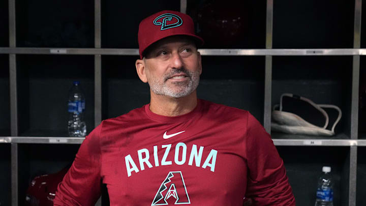 Aug 20, 2025; Phoenix, Arizona, USA; Arizona Diamondbacks manager Torey Lovullo (17) sits in the dugout after defeating the Cleveland Guardians at Chase Field. Mandatory Credit: Rick Scuteri-Imagn Images