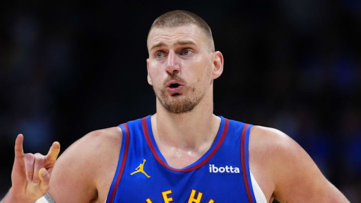 Apr 20, 2026; Denver, Colorado, USA; Denver Nuggets center Nikola Jokic (15) reacts towards the bench in the second half against the Minnesota Timberwolves during game two of the first round of the 2026 NBA Playoffs at Ball Arena. Mandatory Credit: Ron Chenoy-Imagn Images