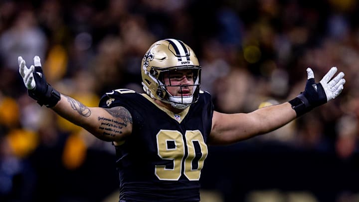 Nov 17, 2024; New Orleans, Louisiana, USA;  New Orleans Saints defensive tackle Bryan Bresee (90) reacts to sacking Cleveland Browns quarterback Jameis Winston (5) during the second half at Caesars Superdome. Mandatory Credit: Stephen Lew-Imagn Images
