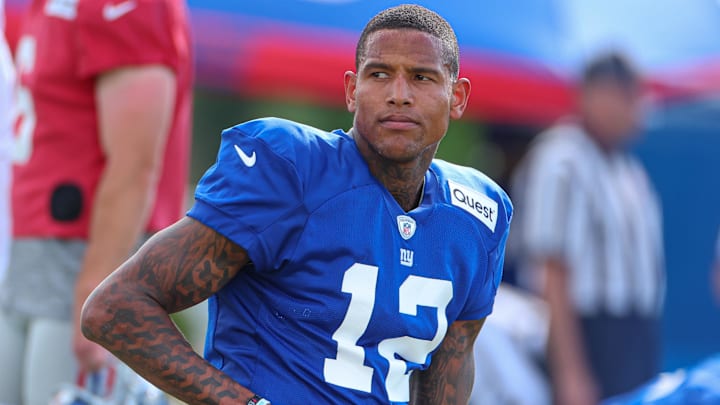 Aug 1, 2023; East Rutherford, NJ, USA; New York Giants tight end Darren Waller (12) stretches during training camp at the Quest Diagnostics Training Facility.  Mandatory Credit: Vincent Carchietta-Imagn Images