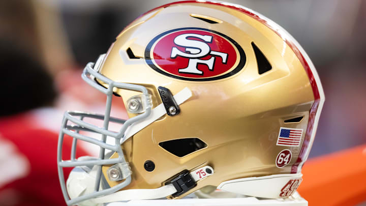 Dec 17, 2023; Glendale, Arizona, USA; Detailed view of a San Francisco 49ers helmet at State Farm Stadium. Mandatory Credit: Mark J. Rebilas-USA TODAY Sports Dec 17, 2023; Glendale, Arizona, USA; Detailed view of a San Francisco 49ers helmet at State Farm Stadium. Mandatory Credit: Mark J. Rebilas-USA TODAY Sports