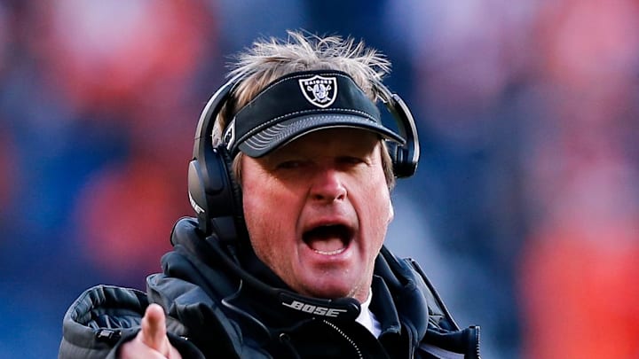 Former Oakland Raiders head coach Jon Gruden reacts after a play