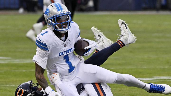 Former Chicago Bears cornerback Nahshon Wright (26) tackles Detroit Lions wide receiver Jameson Williams (1) Former Chicago Bears cornerback Nahshon Wright (26) tackles Detroit Lions wide receiver Jameson Williams (1)