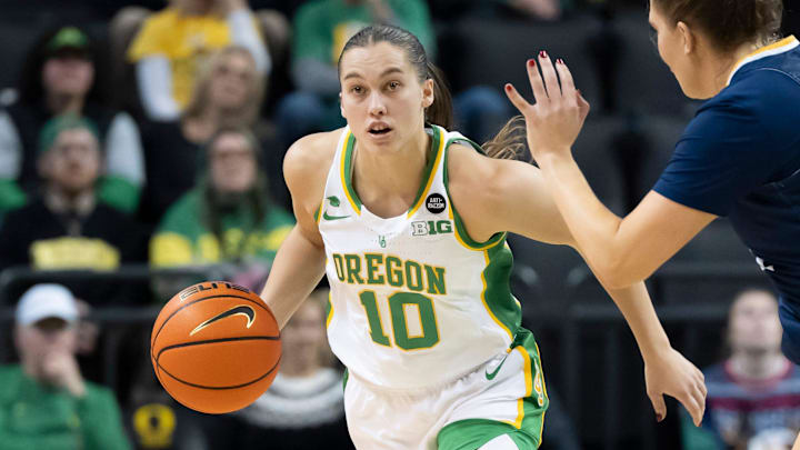 Oregon guard Peyton Scott moves the ball up the court as the Oregon Ducks host the UC Irvine Anteaters Thursday, Dec. 19, 2024 at Matthew Knight Arena in Eugene, Ore.