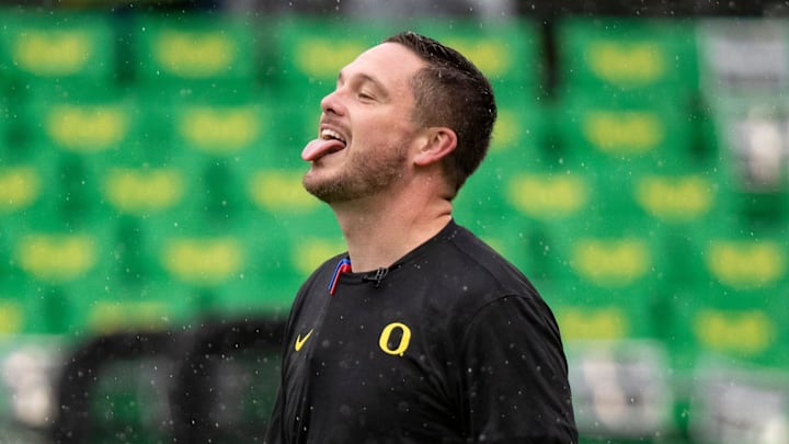 Oregon head coach Dan Lanning sticks his tongue out to catch the rain as the No. 6 Oregon Ducks host California Saturday, Nov. 4, 2023, at Autzen Stadium in Eugene, Ore. Oregon head coach Dan Lanning sticks his tongue out to catch the rain as the No. 6 Oregon Ducks host California Saturday, Nov. 4, 2023, at Autzen Stadium in Eugene, Ore.