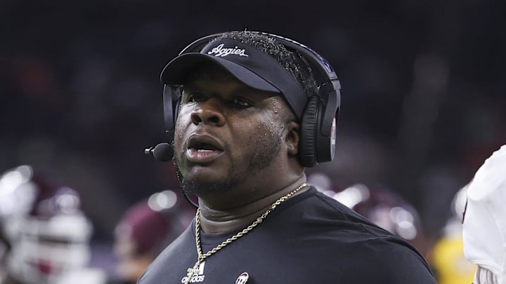 Texas A&M Aggies interim head coach Elijah Robinson on the sideline during the fourth quarter against the Oklahoma State Cowboys at NRG Stadium. Mandatory Credit: Troy Taormina-Imagn Images