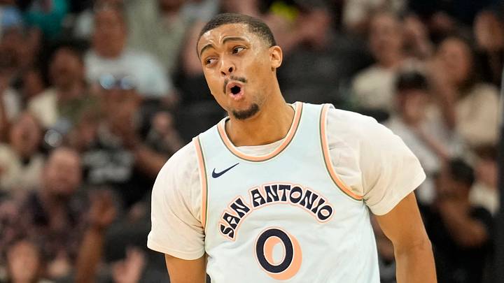 Apr 13, 2025; San Antonio, Texas, USA; San Antonio Spurs forward Keldon Johnson (0) reacts after scoring during the second half against the Toronto Raptors at Frost Bank Center. Mandatory Credit: Scott Wachter-Imagn Images
