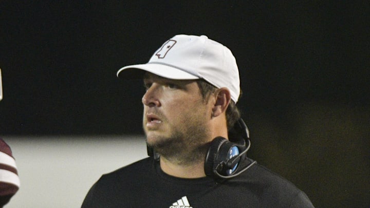 Mississippi State Bulldogs head coach Jeff Lebby speaks with players during the fourth quarter against the Massachusetts Minutemen at Davis Wade Stadium at Scott Field.