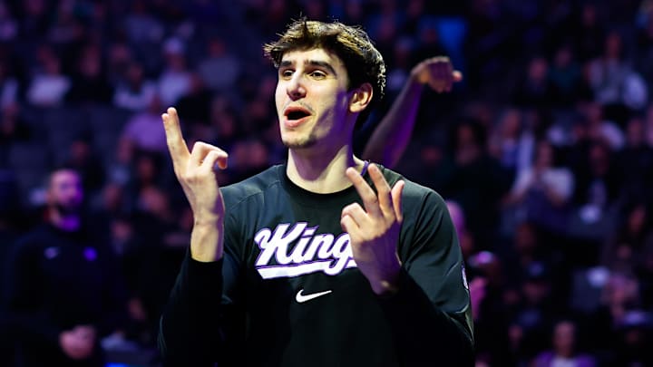 Jan 20, 2026; Sacramento, California, USA; Sacramento Kings center Maxime Raynaud (42) is greeted by teammates during player introductions before the game against the Miami Heat at Golden 1 Center. Mandatory Credit: Sergio Estrada-Imagn Images