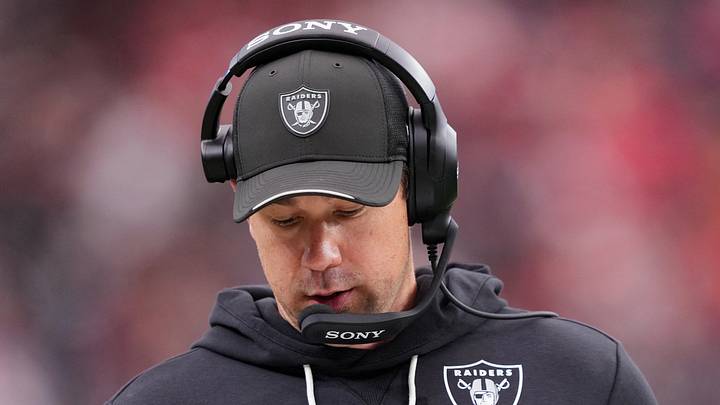 Oct 4, 2026; Paradise, Nevada, USA;  Las Vegas Raiders head coach Klint Kubiak looks at his play sheet against the Kansas City Chiefs during the third quarter at Allegiant Stadium.  Mandatory Credit: Joe Camporeale-Imagn Images