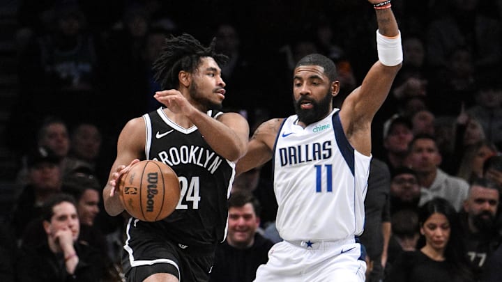 Feb 6, 2024; Brooklyn, New York, USA; Brooklyn Nets guard Cam Thomas (24) drives to the basket while being defended by Dallas Mavericks guard Kyrie Irving (11) during the first quarter at Barclays Center. Mandatory Credit: John Jones-Imagn Images Feb 6, 2024; Brooklyn, New York, USA; Brooklyn Nets guard Cam Thomas (24) drives to the basket while being defended by Dallas Mavericks guard Kyrie Irving (11) during the first quarter at Barclays Center. Mandatory Credit: John Jones-Imagn Images