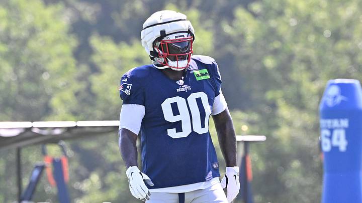 Jul 28, 2025; Foxborough, MA, USA; New England Patriots defensive tackle Christian Barmore (90) gets warmed up during training camp at Gillette Stadium. Mandatory Credit: Eric Canha-Imagn Images Jul 28, 2025; Foxborough, MA, USA; New England Patriots defensive tackle Christian Barmore (90) gets warmed up during training camp at Gillette Stadium. Mandatory Credit: Eric Canha-Imagn Images