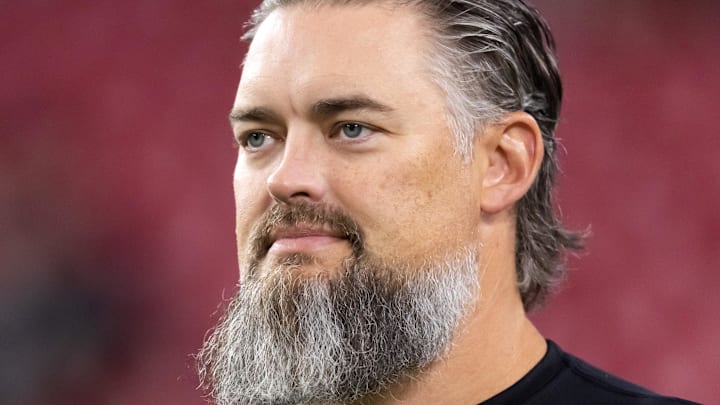 Aug 23, 2025; Glendale, Arizona, USA; Las Vegas Raiders offensive line coach Brennan Carroll against the Arizona Cardinals during a preseason NFL game at State Farm Stadium. Mandatory Credit: Mark J. Rebilas-Imagn Images