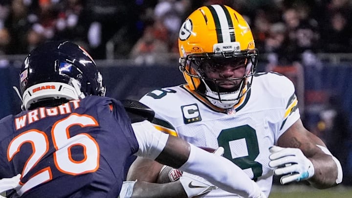 Green Bay Packers running back Josh Jacobs (8) runs with the ball against Chicago Bears cornerback Nahshon Wright.