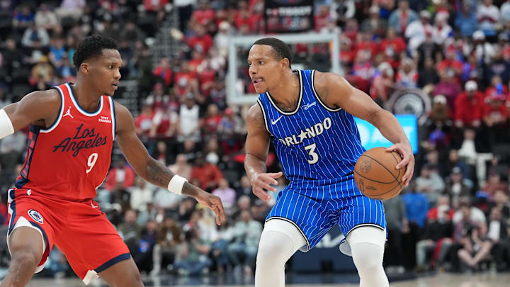Feb 22, 2026; Inglewood, California, USA; Orlando Magic guard Desmond Bane (3) dribbles the ball against LA Clippers guard Bennedict Mathurin (9) in the second half at Intuit Dome. Mandatory Credit: Kirby Lee-Imagn Images