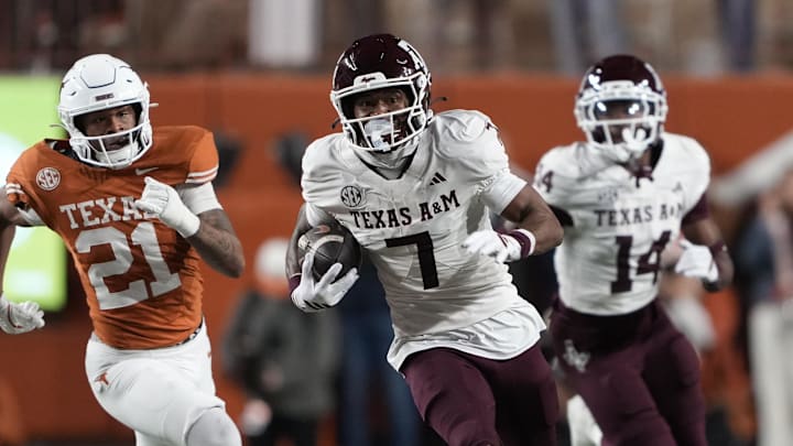 Texas A&M Aggies wide receiver KC Concepcion (7) returns a punt during the first half against the Texas Longhorns at Darrell K Royal-Texas Memorial Stadium. 