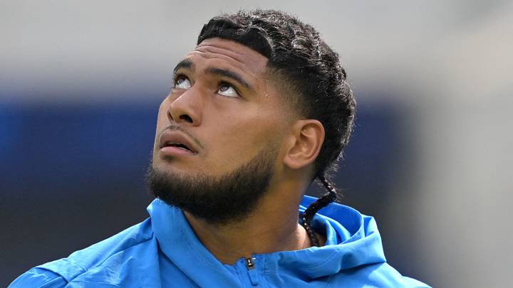  Los Angeles Chargers linebacker Tuli Tuipulotu (45) warms up
