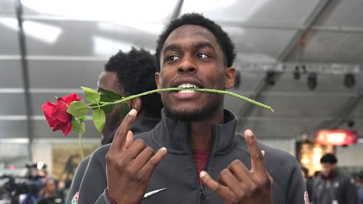 Dec 30, 2023; Pasadena, CA, USA; Alabama Crimson Tide wide receiver Malik Benson (11) and linebacker Justin Jefferson (28) react during Rose Bowl media day at Rose Bowl Stadium. Mandatory Credit: Kirby Lee-Imagn Images