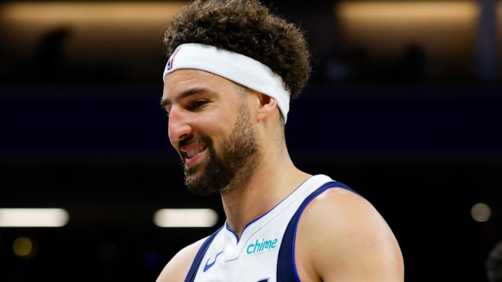 Dallas Mavericks guard Klay Thompson celebrates with teammates after exciting the court during the fourth quarter against the Sacramento Kings at Golden 1 Center. Mandatory Credit: Sergio Estrada-Imagn Images