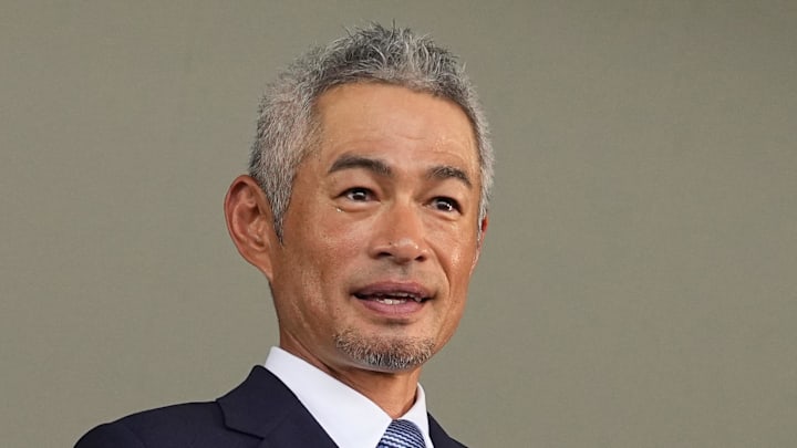 Ichiro Suzuki poses with his plaque after being inducted into the National Baseball Hall of Fame on July 27 in Cooperstown, N.Y.